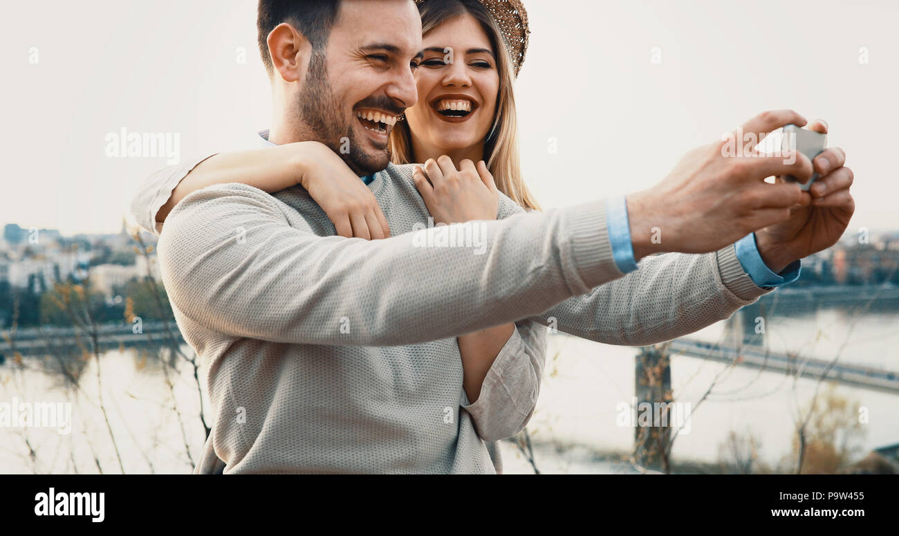 Couple in love taking selfies while traveling Stock Photo Alamy