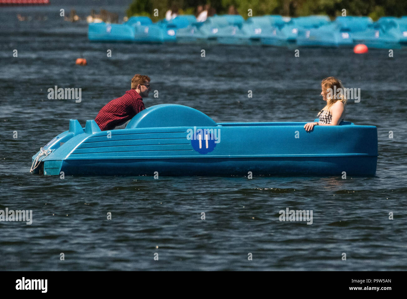 Londoners enjoy the sunny weather in Hyde Park. Featuring Atmosphere