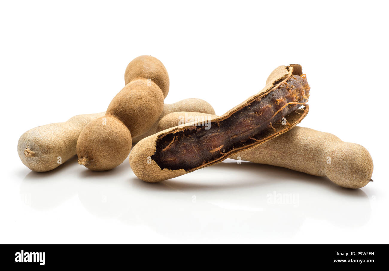 Tamarind one open isolated on white background Indian date brown jelly
