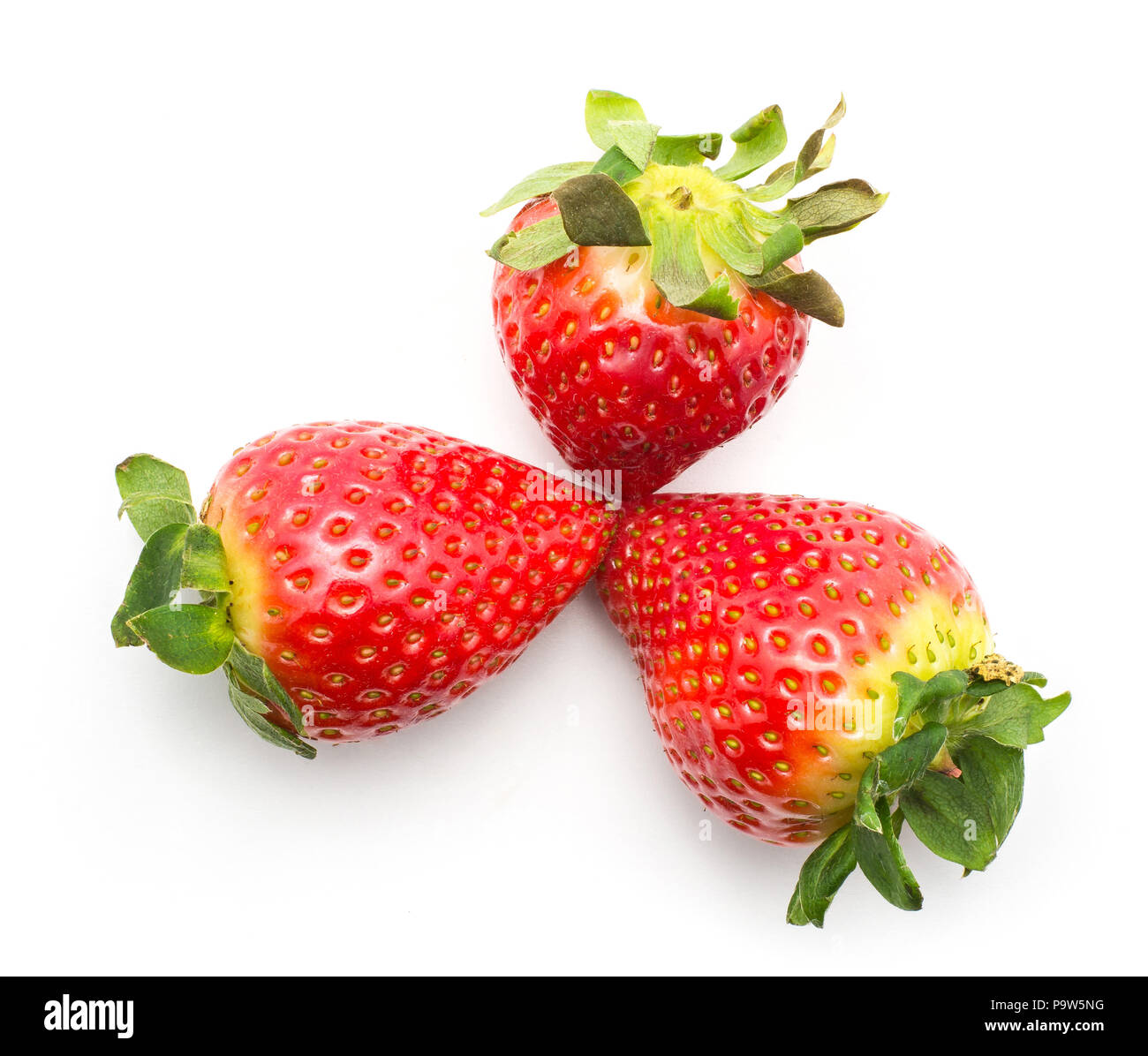 Three garden strawberries put together isolated on white background Stock Photo