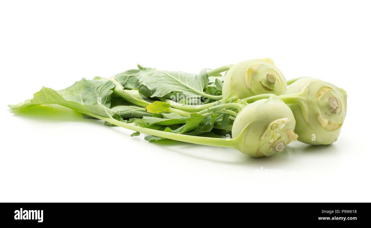 Three kohlrabi (German turnip or turnip cabbage) bulbs with fresh