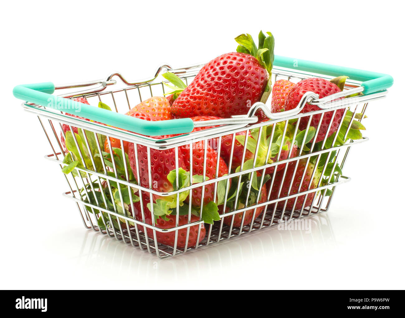 Strawberries in a shopping basket isolated on white background Stock Photo