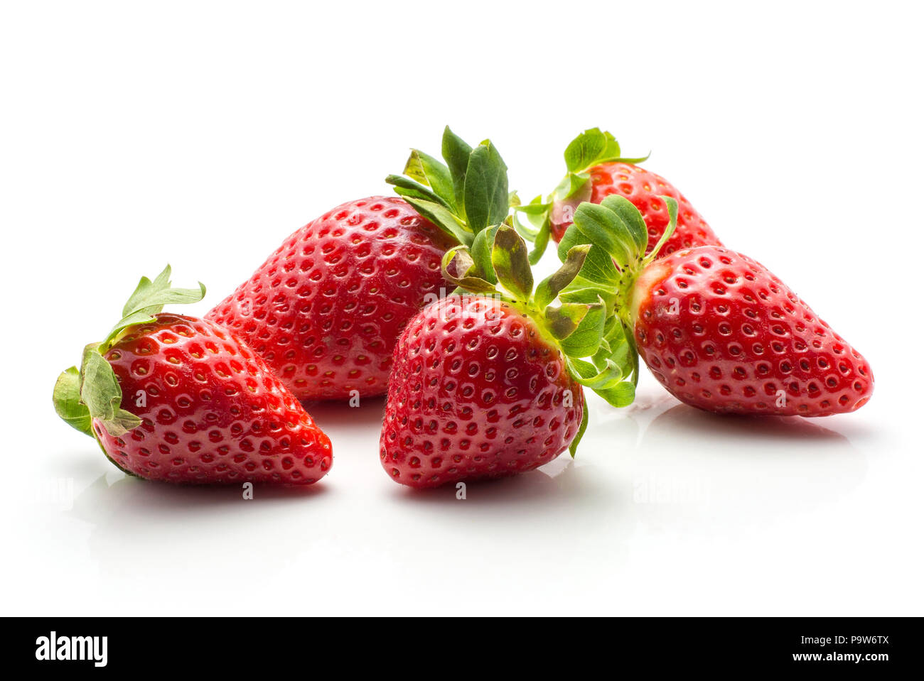 Five garden strawberries isolated on white background ripe fresh Stock Photo