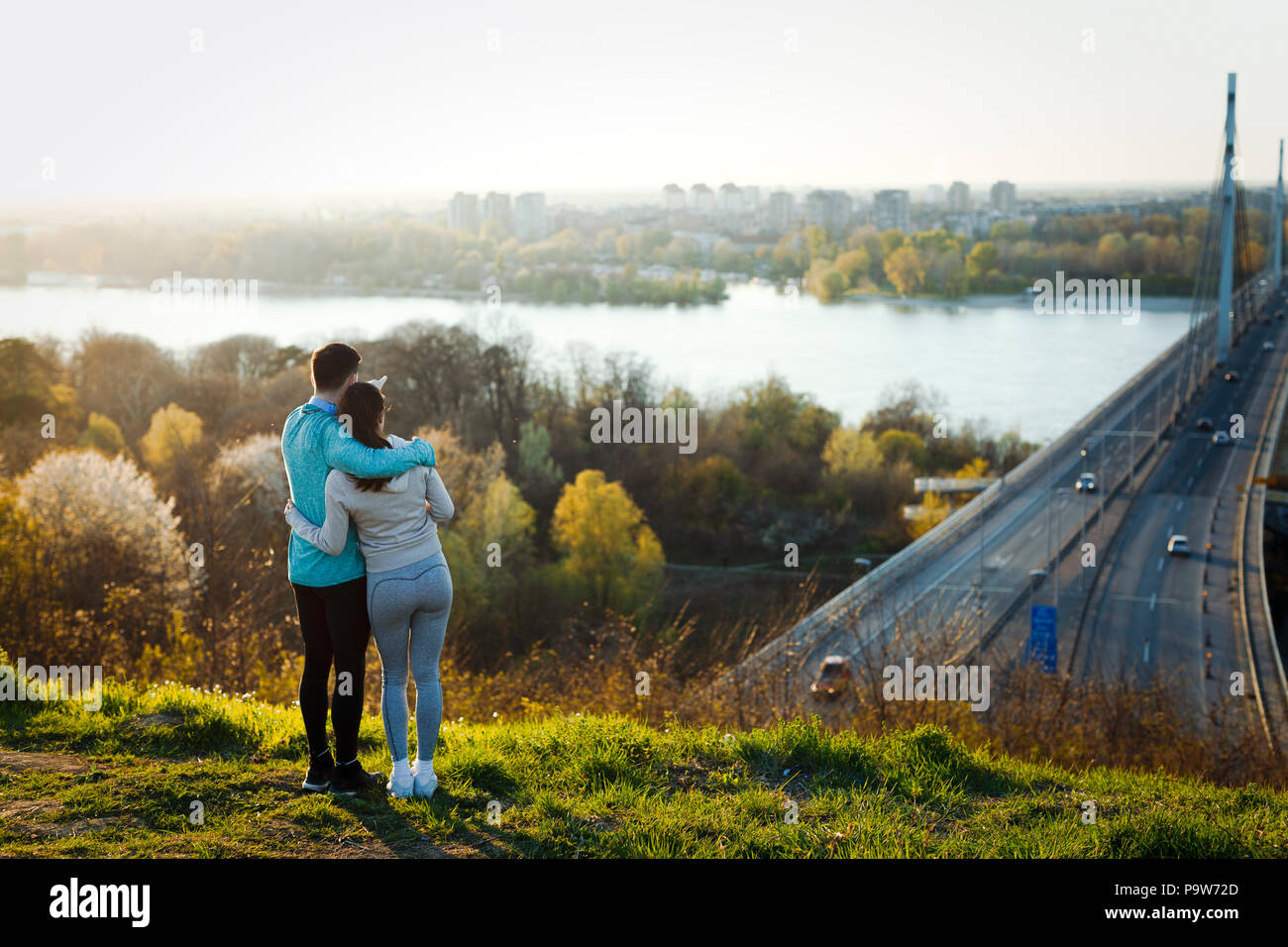 Happy young sporty couple sharing romantic moments Stock Photo - Alamy