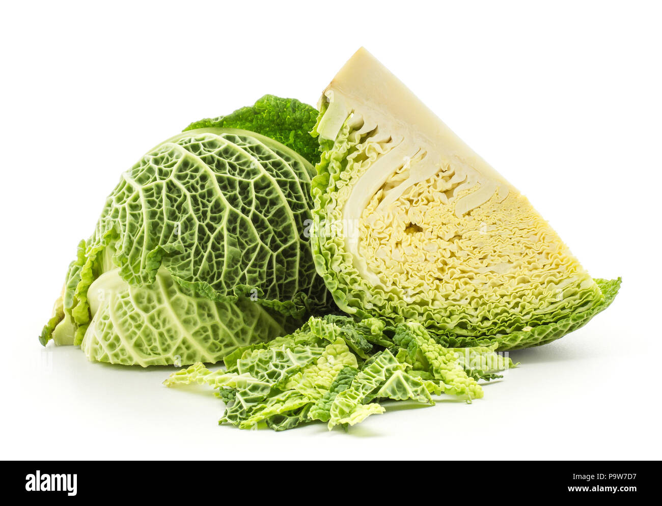 Savoy cabbage two quarters with chopped leaves stack isolated on white