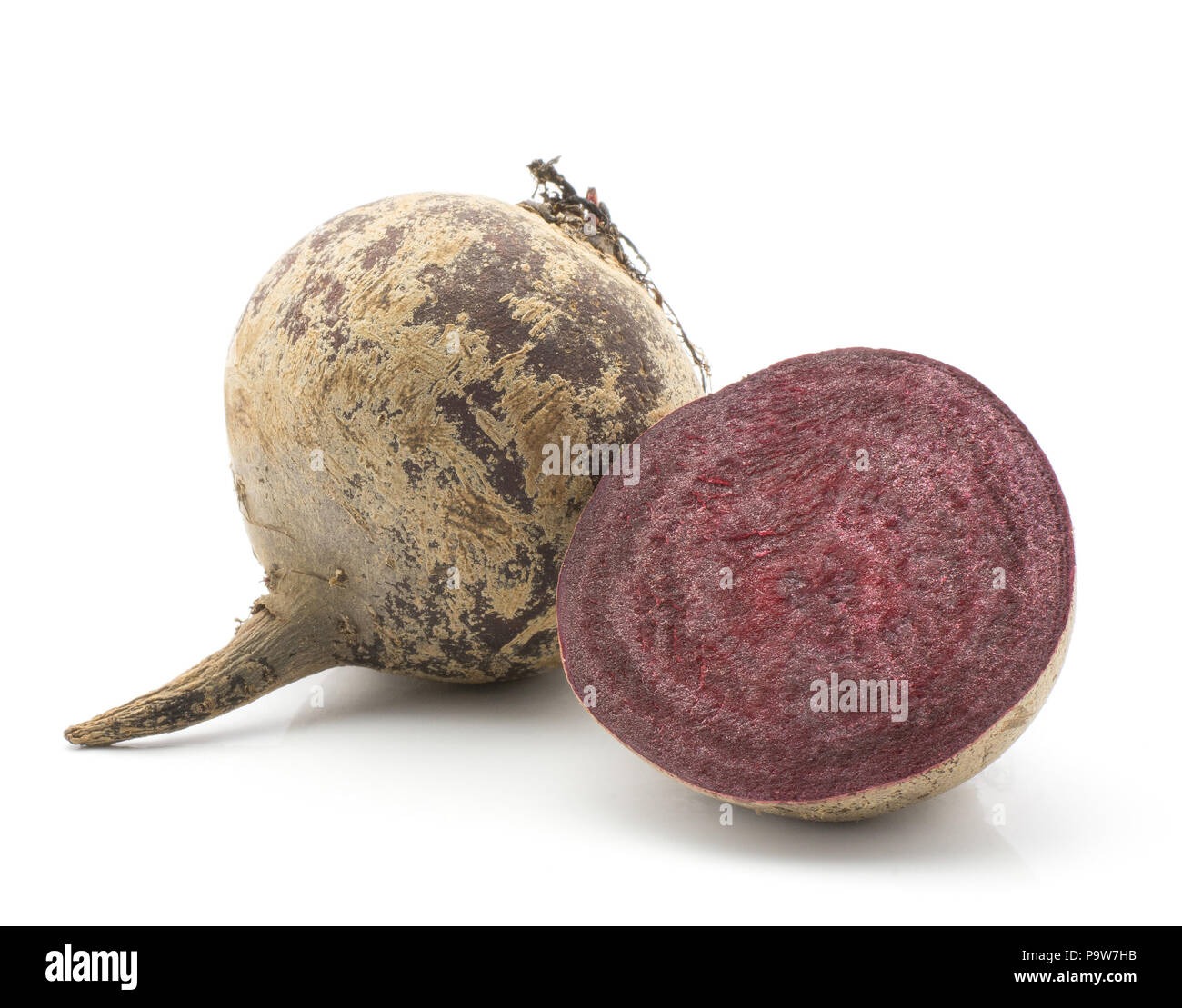 One beetroot bulb and a half (raw red beet) isolated on white background  Stock Photo - Alamy