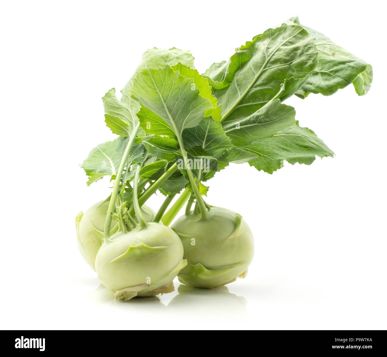 Kohlrabi (German turnip or turnip cabbage) three raw bulbs with fresh