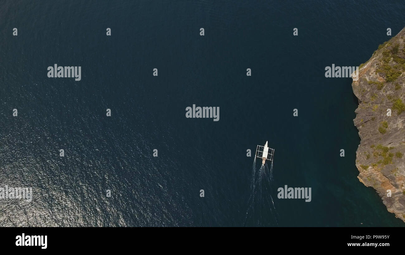 Aerial view of motor boat in sea. Aerial image of motorboat floating in ...