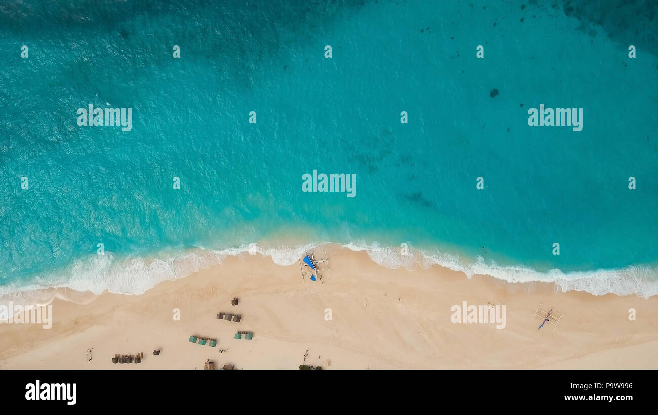 Aerial view of beautiful tropical island with white sand beach, hotels ...