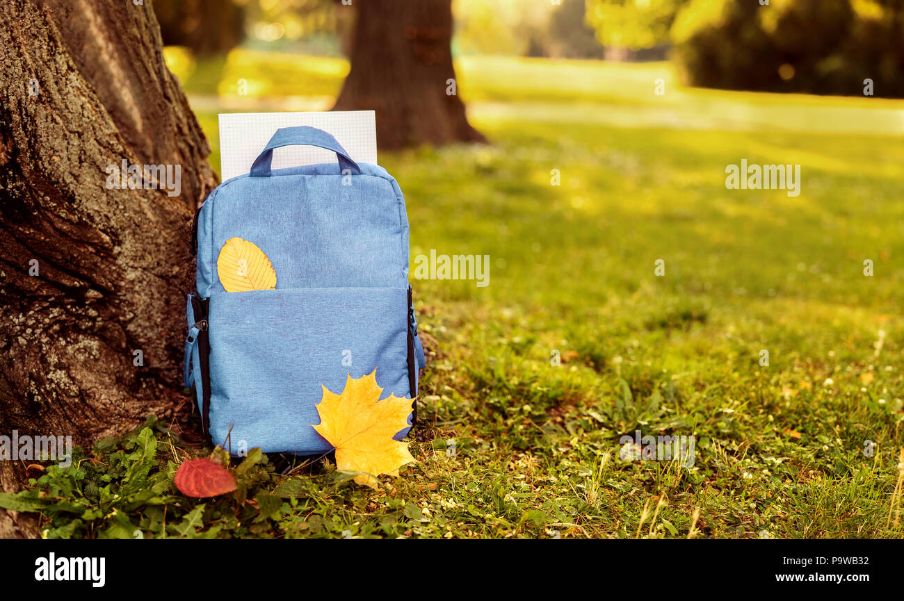 Close up of blue school bag outdoors Stock Photo