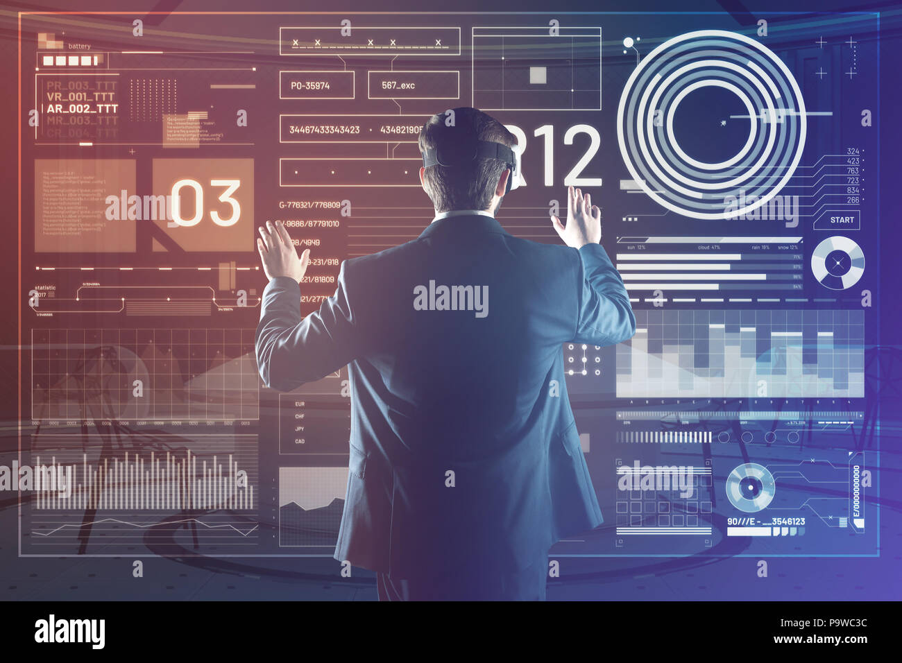 Virtual reality. Clever progressive programmer creating a useful programmer while using a virtual reality device Stock Photo