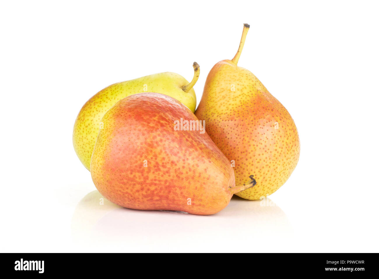 Group of three whole fresh red pear forelle variety stack isolated on white Stock Photo