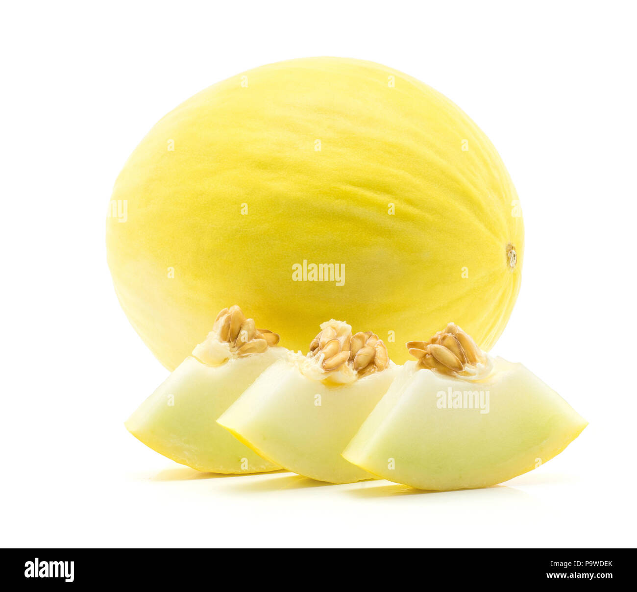 One yellow honeydew melon with three cut pieces isolated on white background Stock Photo