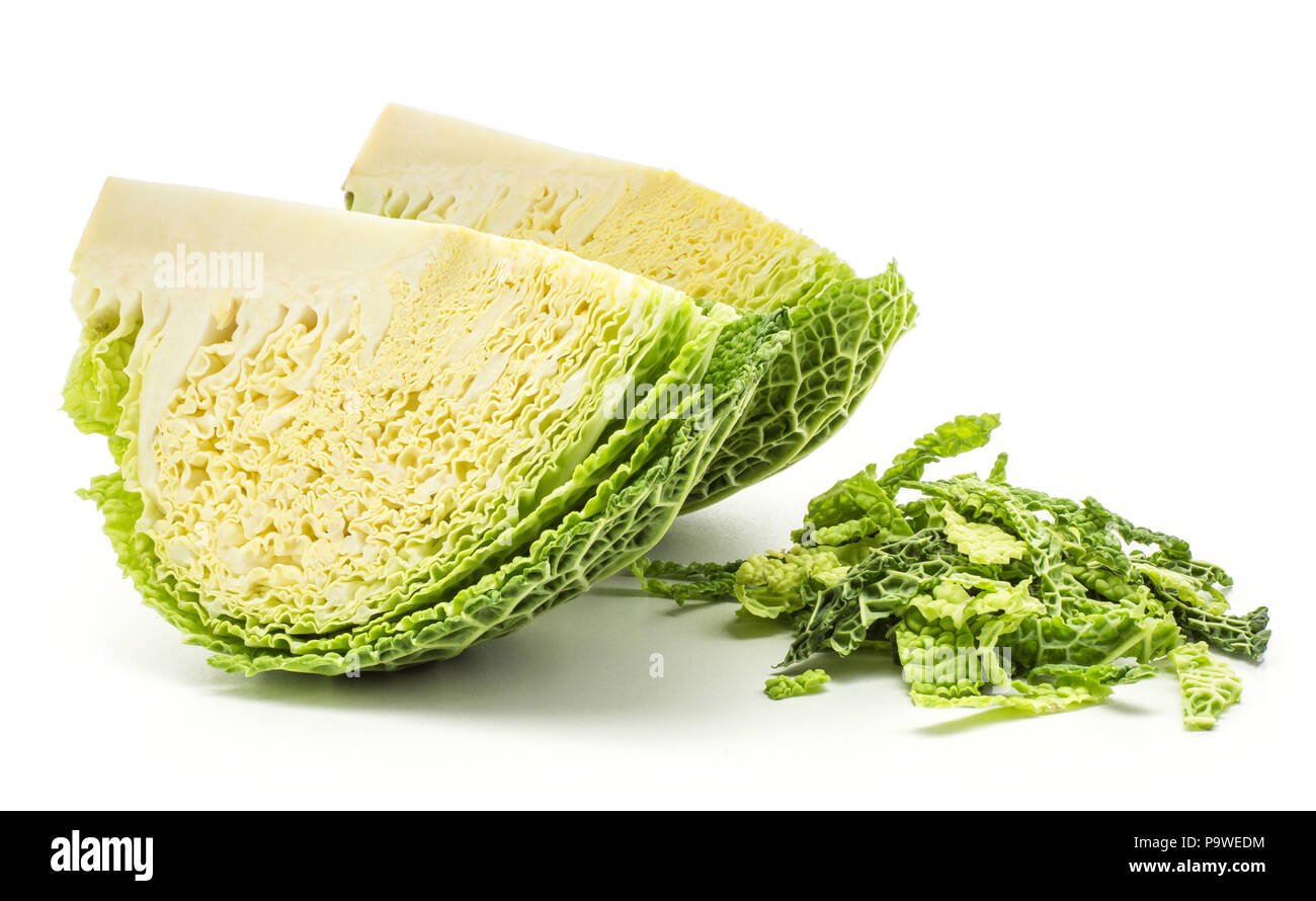 Two savoy cabbage quarters with chopped leaves stack isolated on white