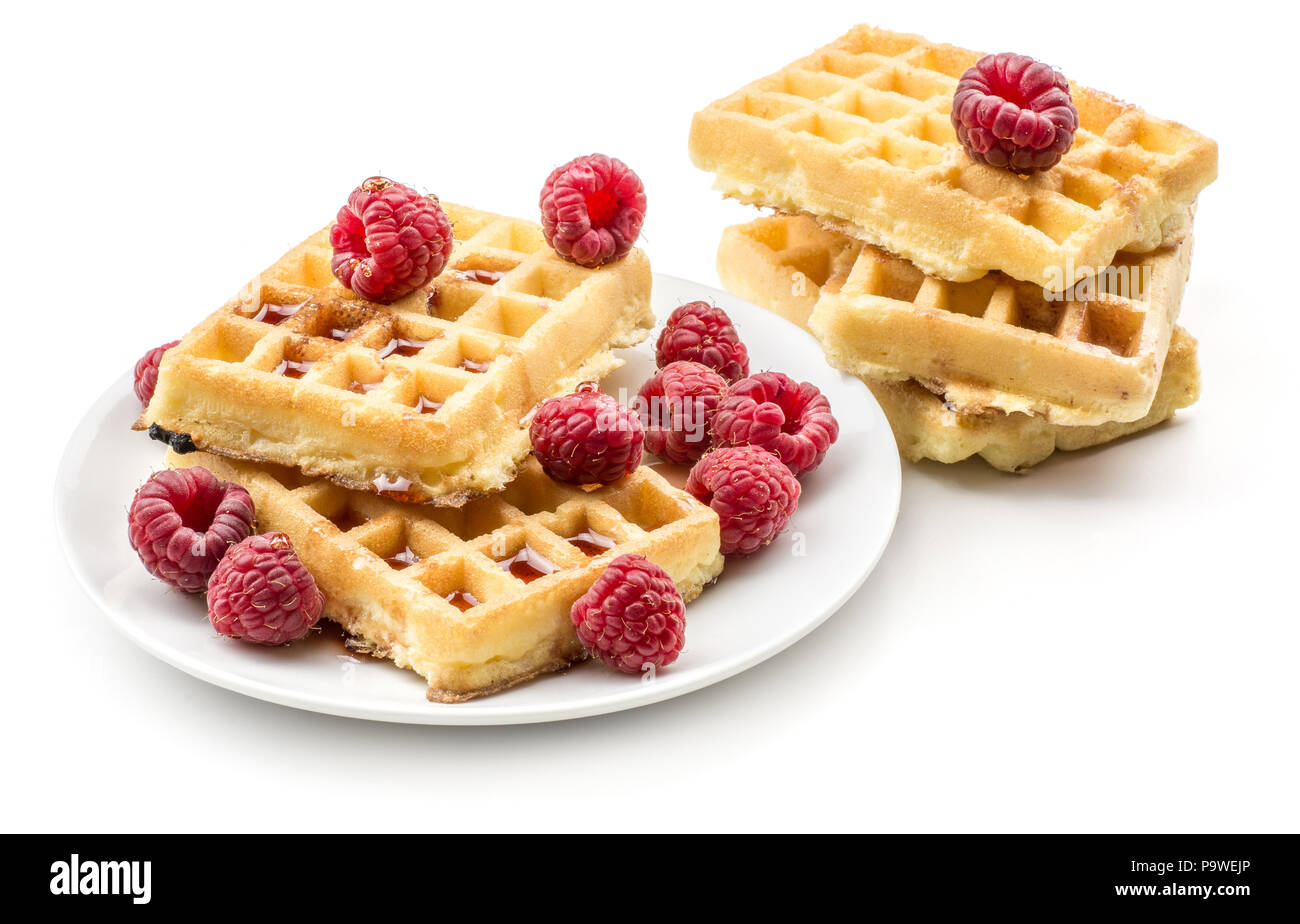 Traditional waffle (Belgian) with fresh raspberries on a saucer and ...