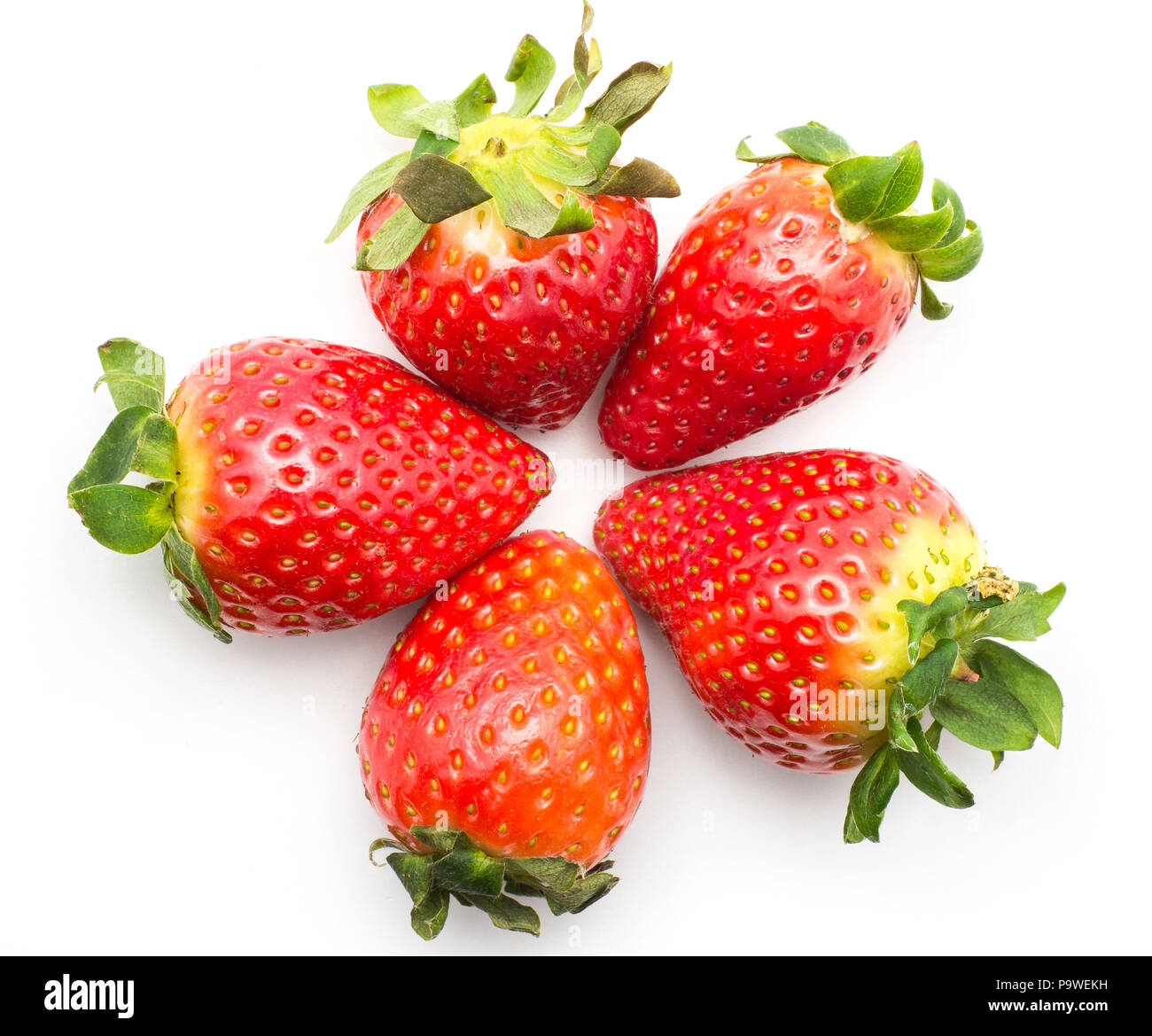Five garden strawberries put together like a flower isolated on white background Stock Photo
