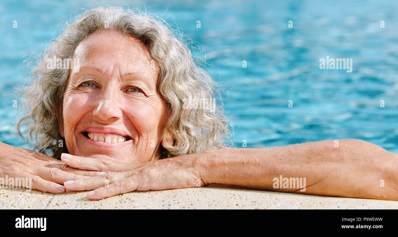 Elderly woman swimming hi-res stock photography and images - Alamy