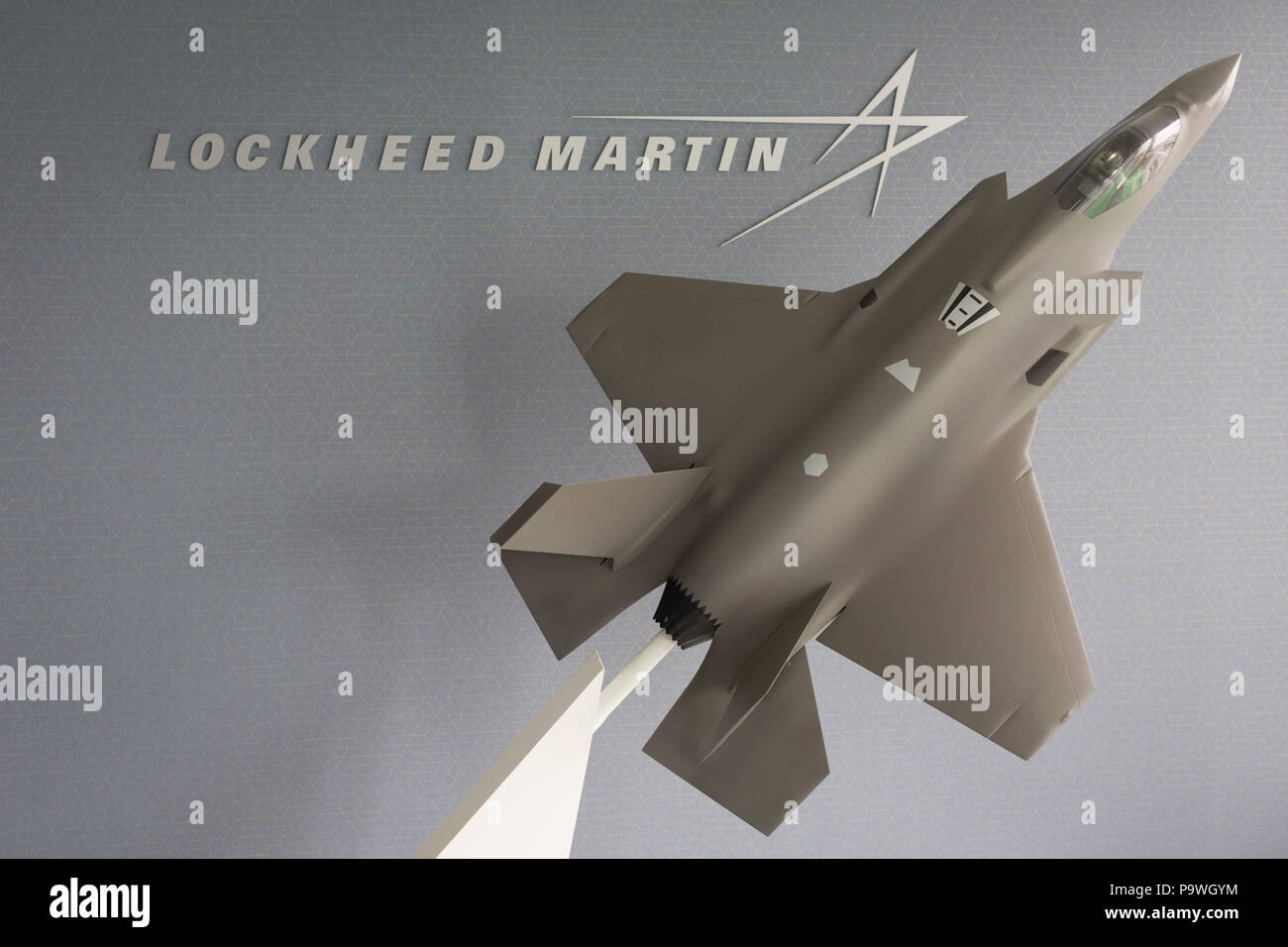 The Lockheed Martin logo and a model of their F-35 Lightening fighter in the company's hospitality chalet at the Farnborough Airshow, on 18th July 2018, in Farnborough, England. Stock Photo