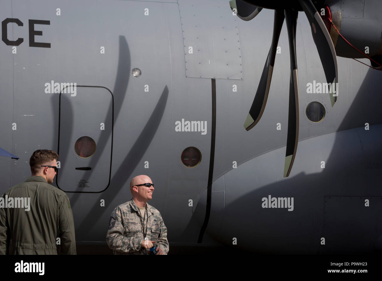 US Airforce personnel and their C-130 Hercules at the Farnborough Airshow, on 16th July 2018, in Farnborough, England. Stock Photo