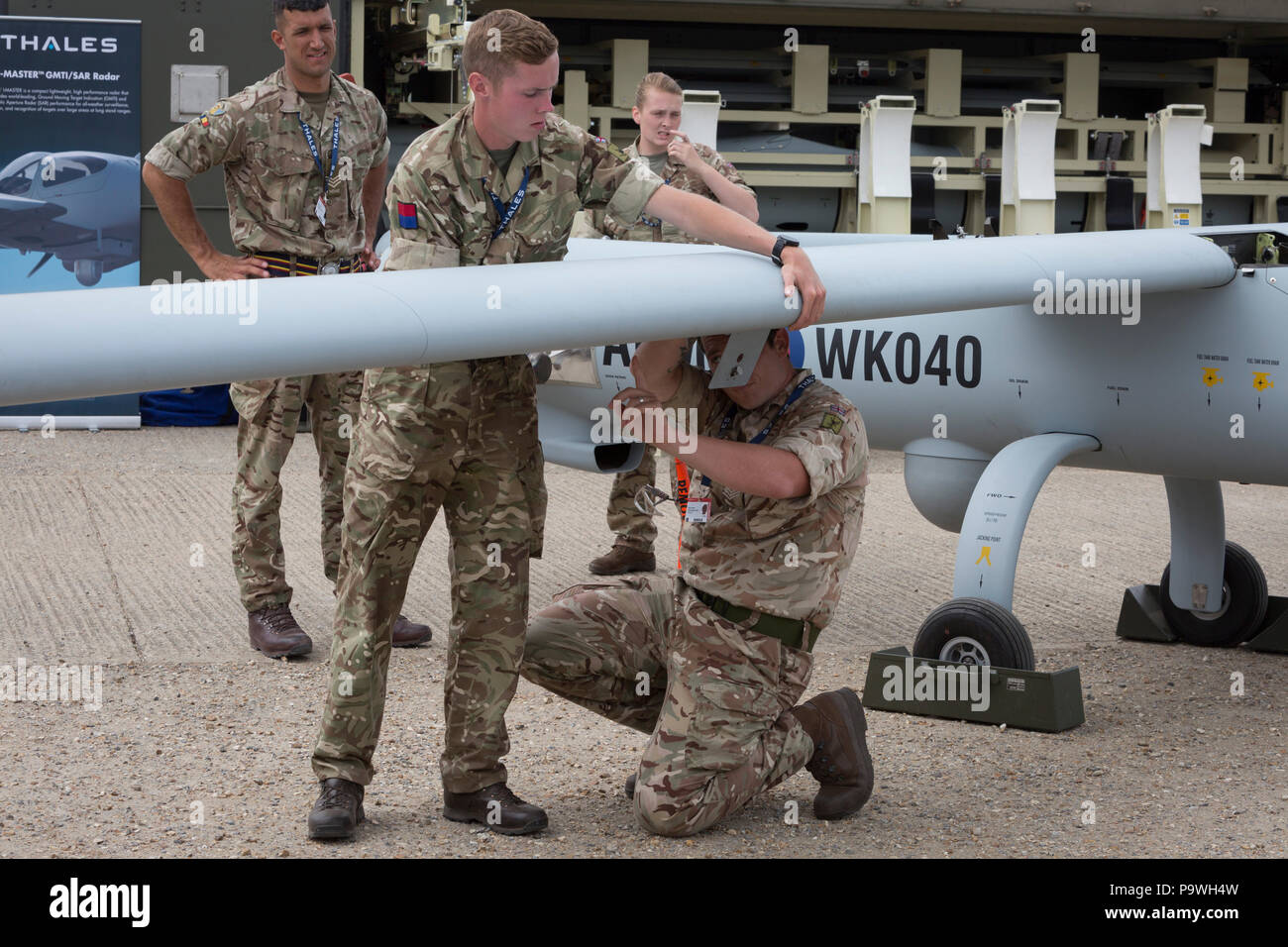 Members of British Army's Royal Artillery, demonstrate the rapid deployment of a Thales Watchkeeper UAV at the Farnborough Airshow, on 18th July 2018, in Farnborough, England. Stock Photo