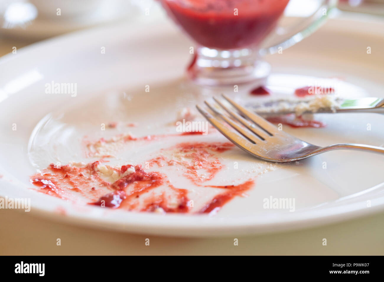 Plate with food leftovers, closeup Stock Photo Alamy