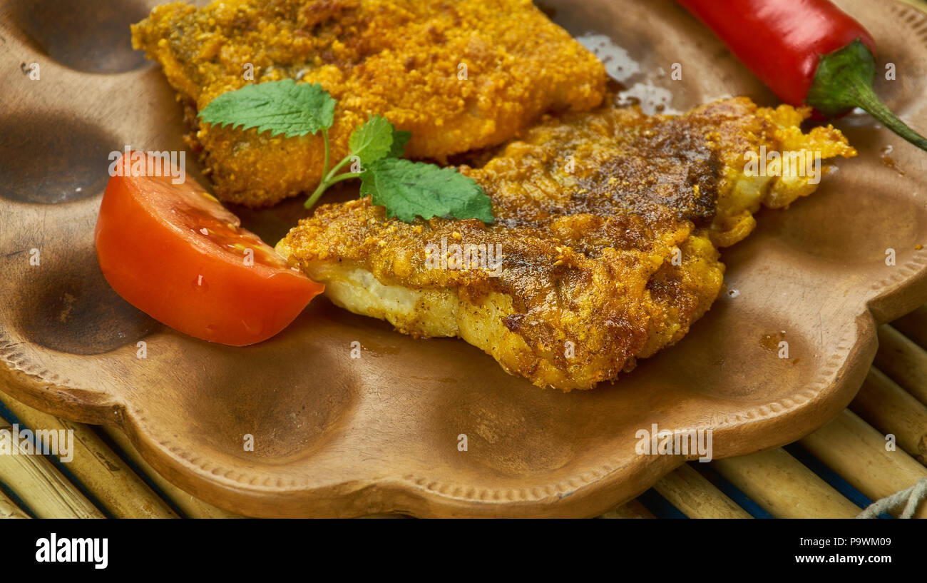 Chettinad Fish Fry - Chettinad cuisine , Fish fillet marinated in chettinad style masala and then shallow fried in oil Stock Photo
