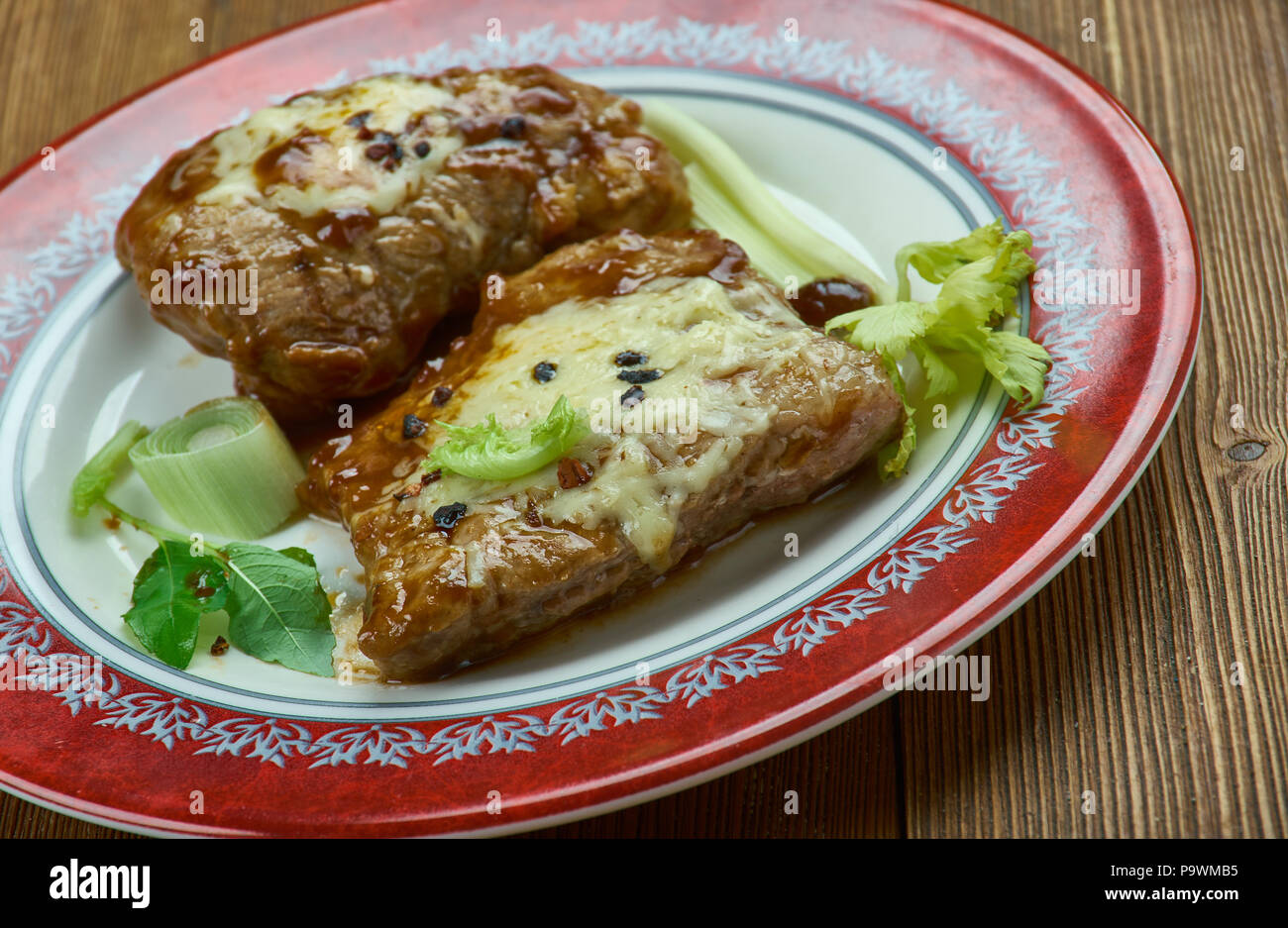Cheesy Garlic And Brown Sugar Pork Chops Better Is A Splash Of Bourbon Stock Photo Alamy
