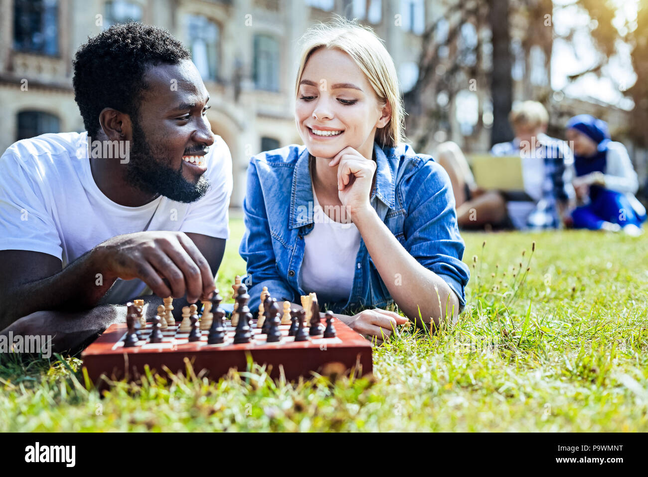 friends playing chess, Stock image