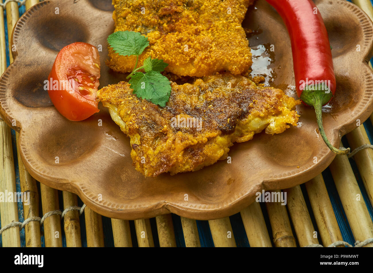 Chettinad Fish Fry - Chettinad cuisine , Fish fillet marinated in chettinad style masala and then shallow fried in oil Stock Photo