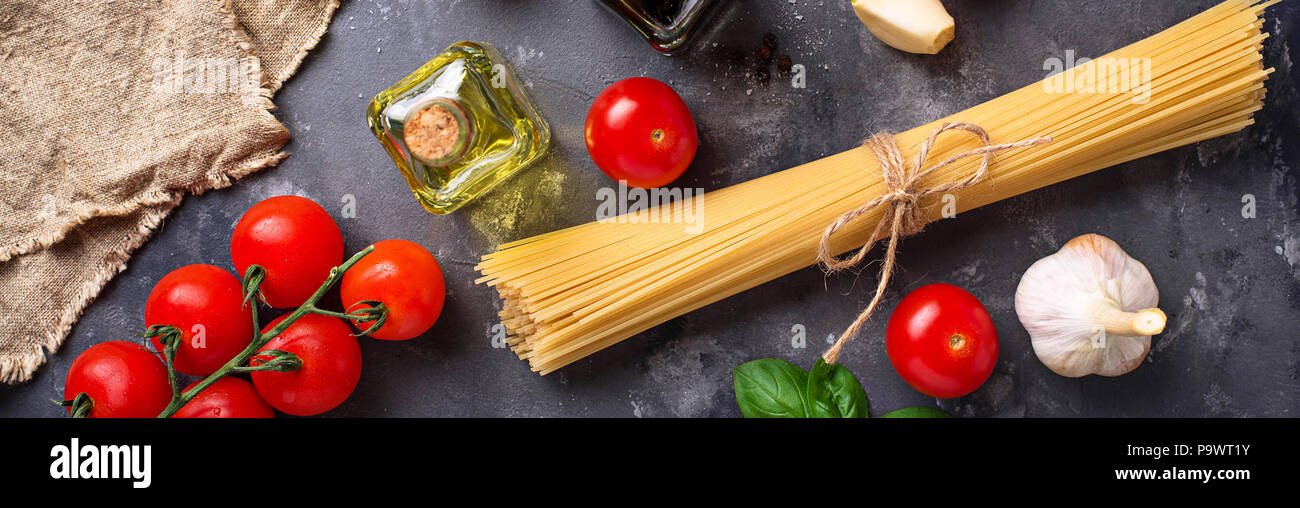 Pasta, tomatoes, olive oil and vinegar Stock Photo Alamy