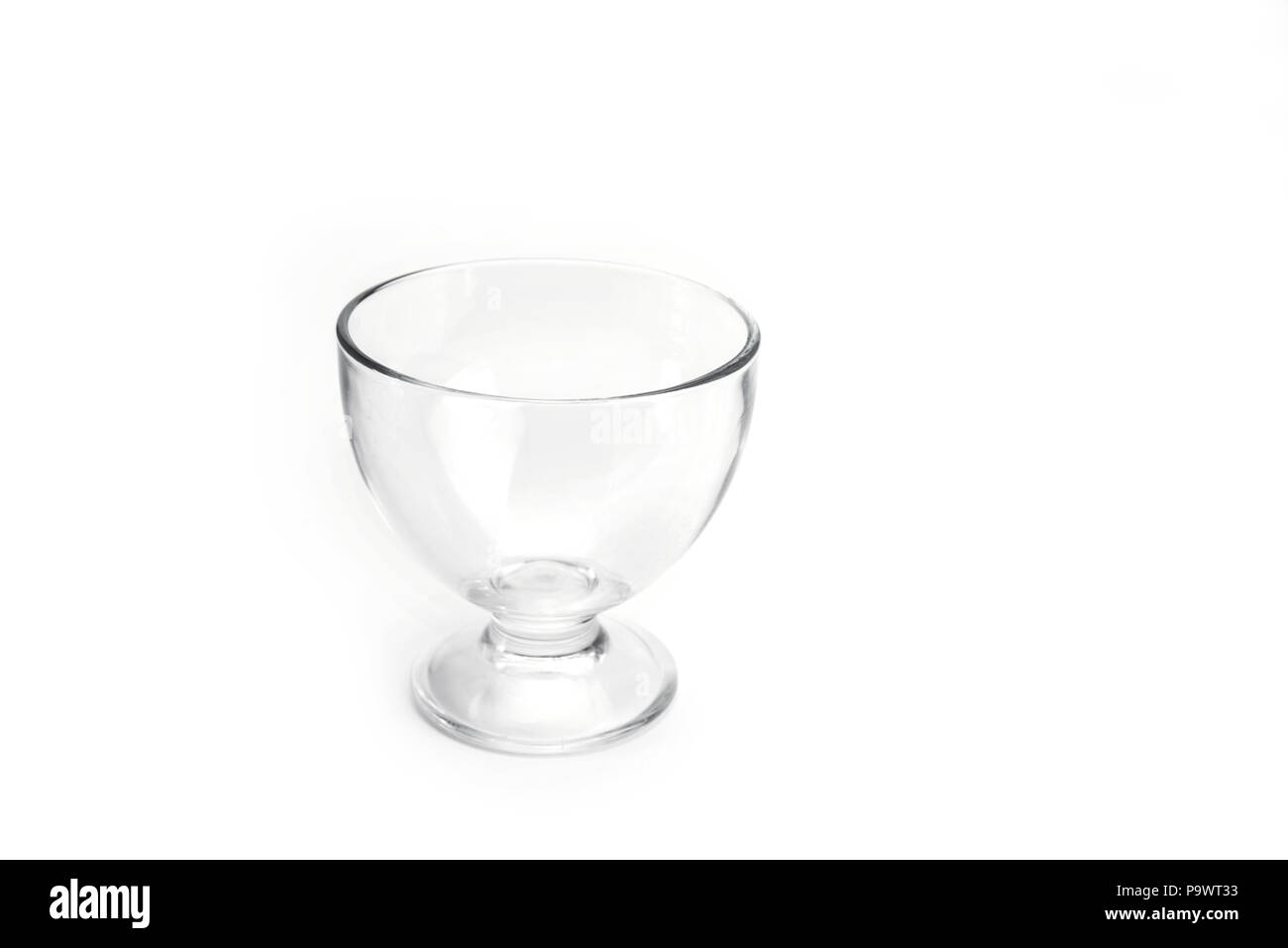 Empty Glass of Ice Cream or pudding on the white Stock Photo