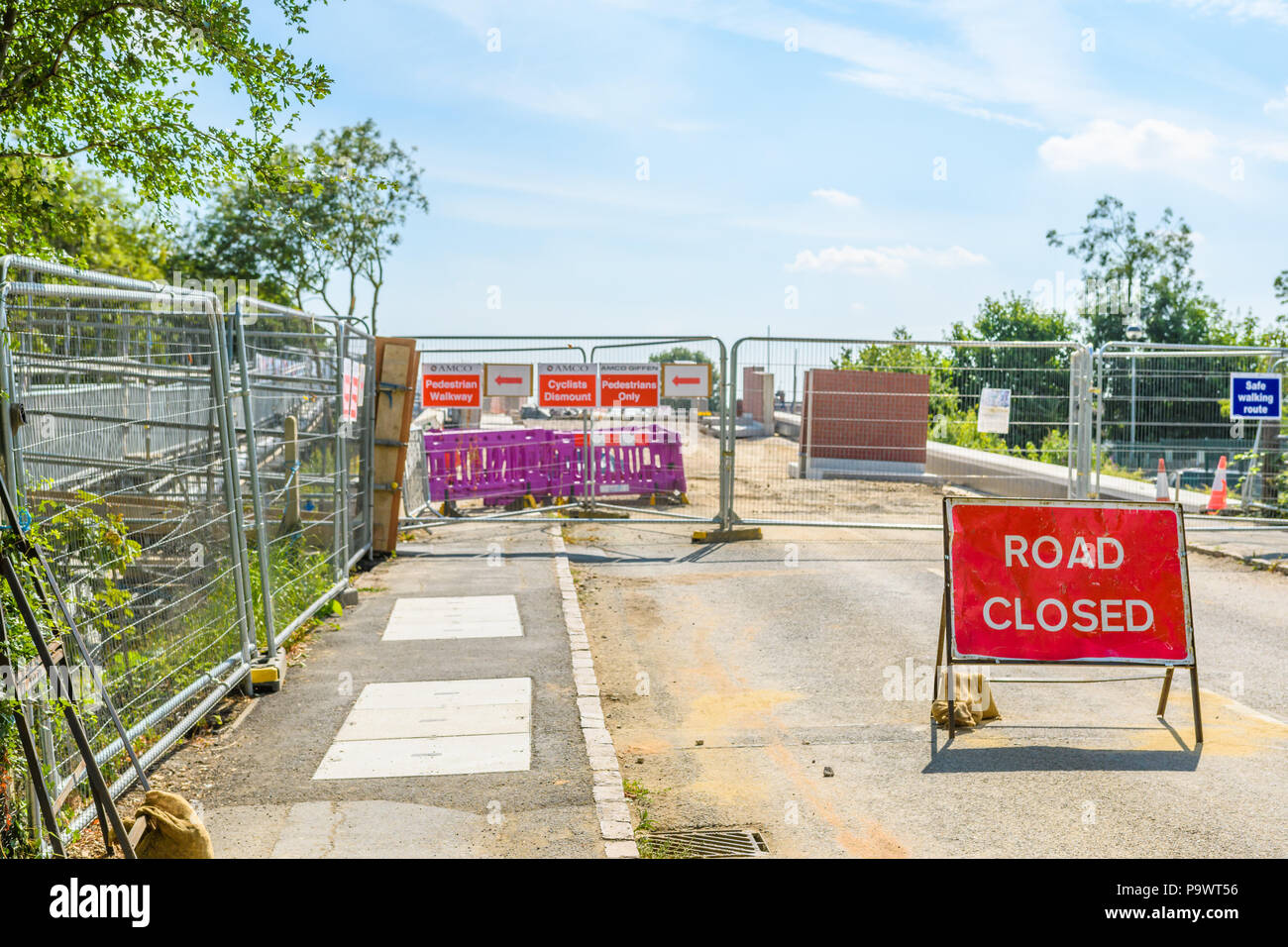Work in progress raising the road bridge on the Cottingham road over the railway line next to the rail staion at Corby, England, July 2018. Stock Photo