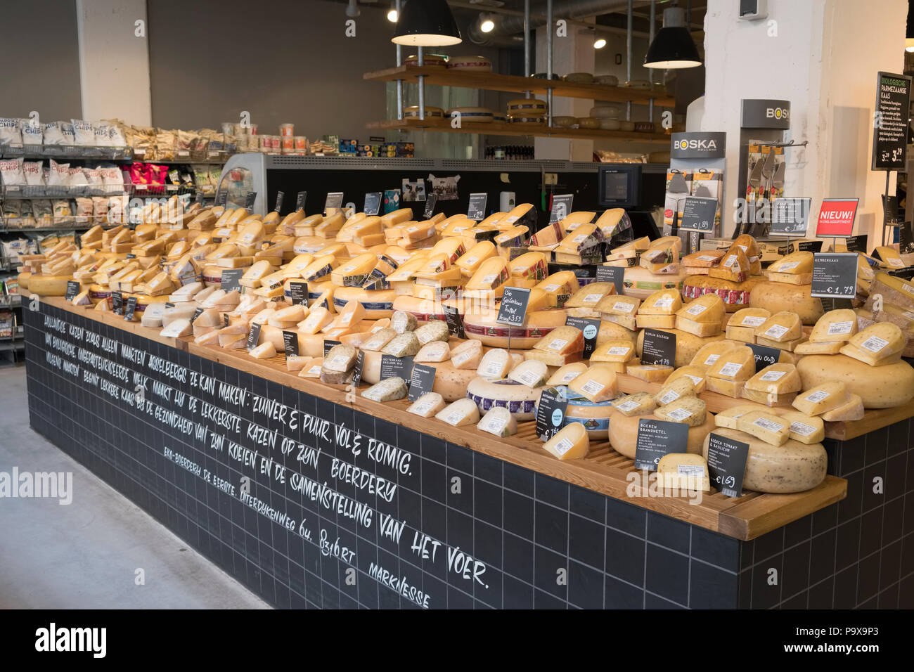 Cheeses on display in a cheese shop in Amsterdam, Netherlands, Holland, Europe Stock Photo