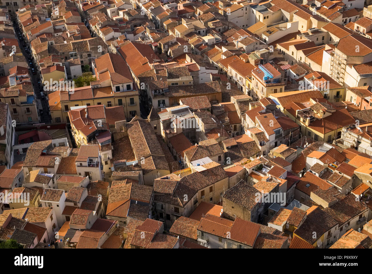 Aerial view of the packed crowded city and red rooftops of Cefalu, Sicily, Italy, Europe Stock Photo