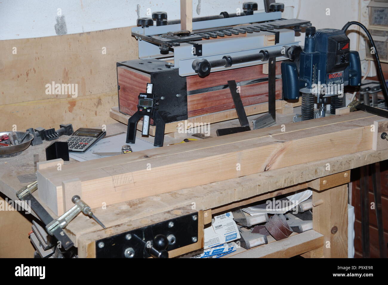 carpenter using tools build furniture Stock Photo Alamy