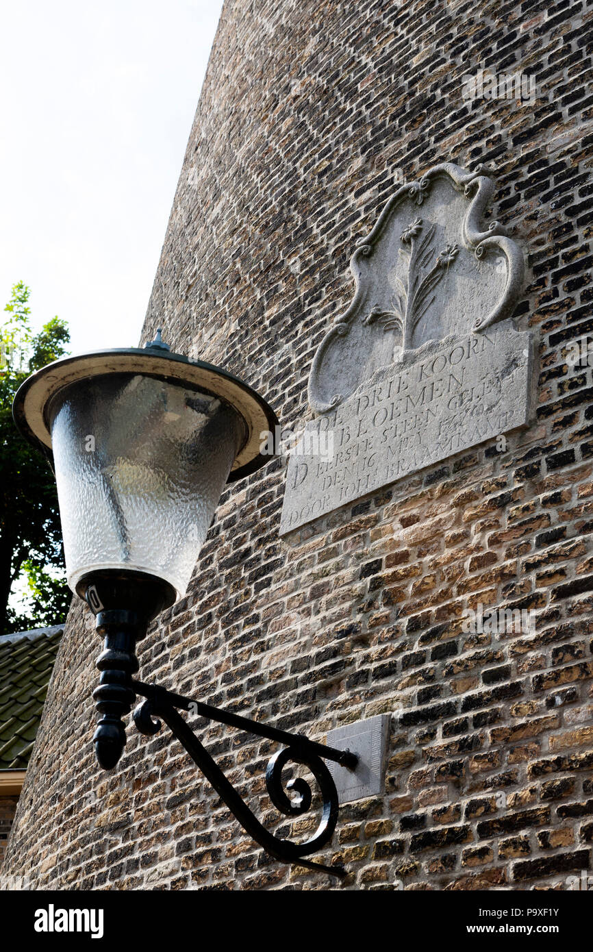 Inscription on De Drie Koornbloemen windmill in Schiedam, the Netherlands. The mill dates from 1770. Stock Photo