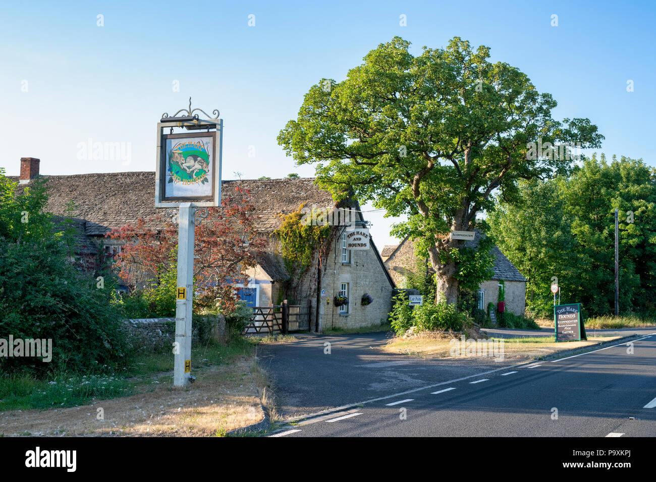 The Hare and Hounds pub at Foss cross, Cotswolds, Chedworth, Gloucestershire. UK Stock Photo