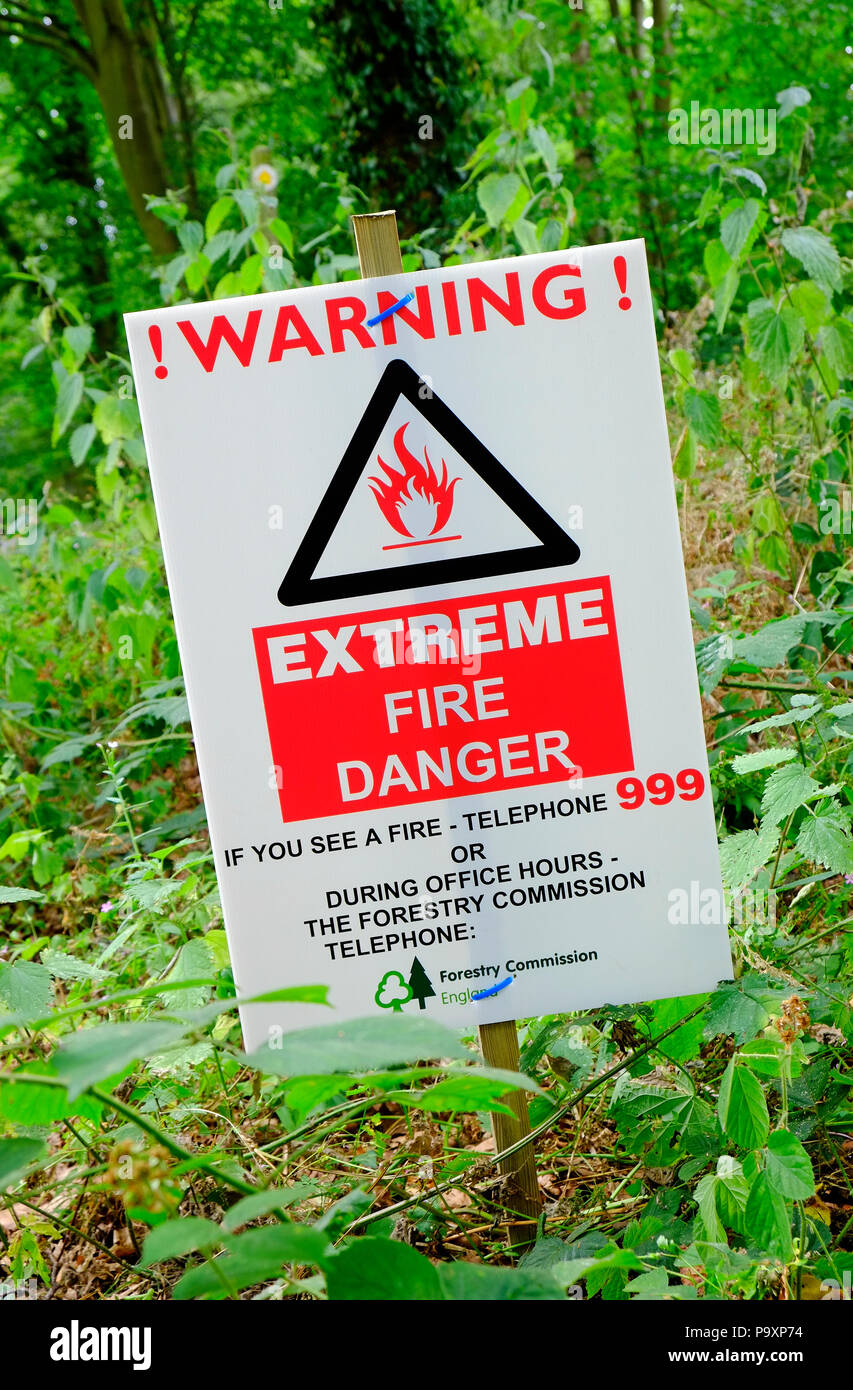 warning extreme fire danger sign in woodland, norfolk, england Stock Photo