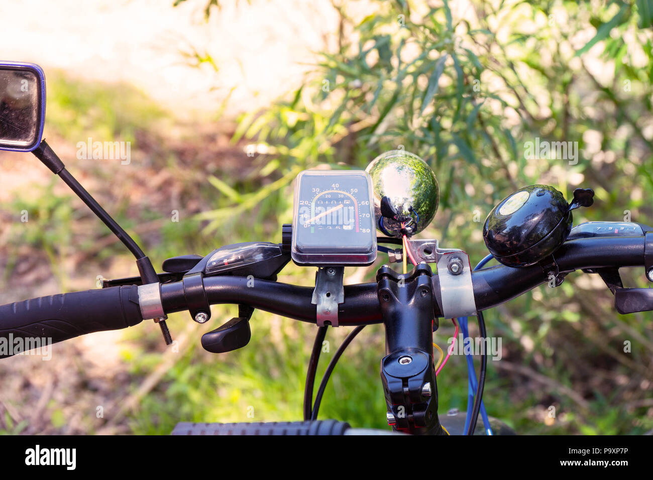 Handlebar of a modern bicycle with a speedometer Stock Photo Alamy