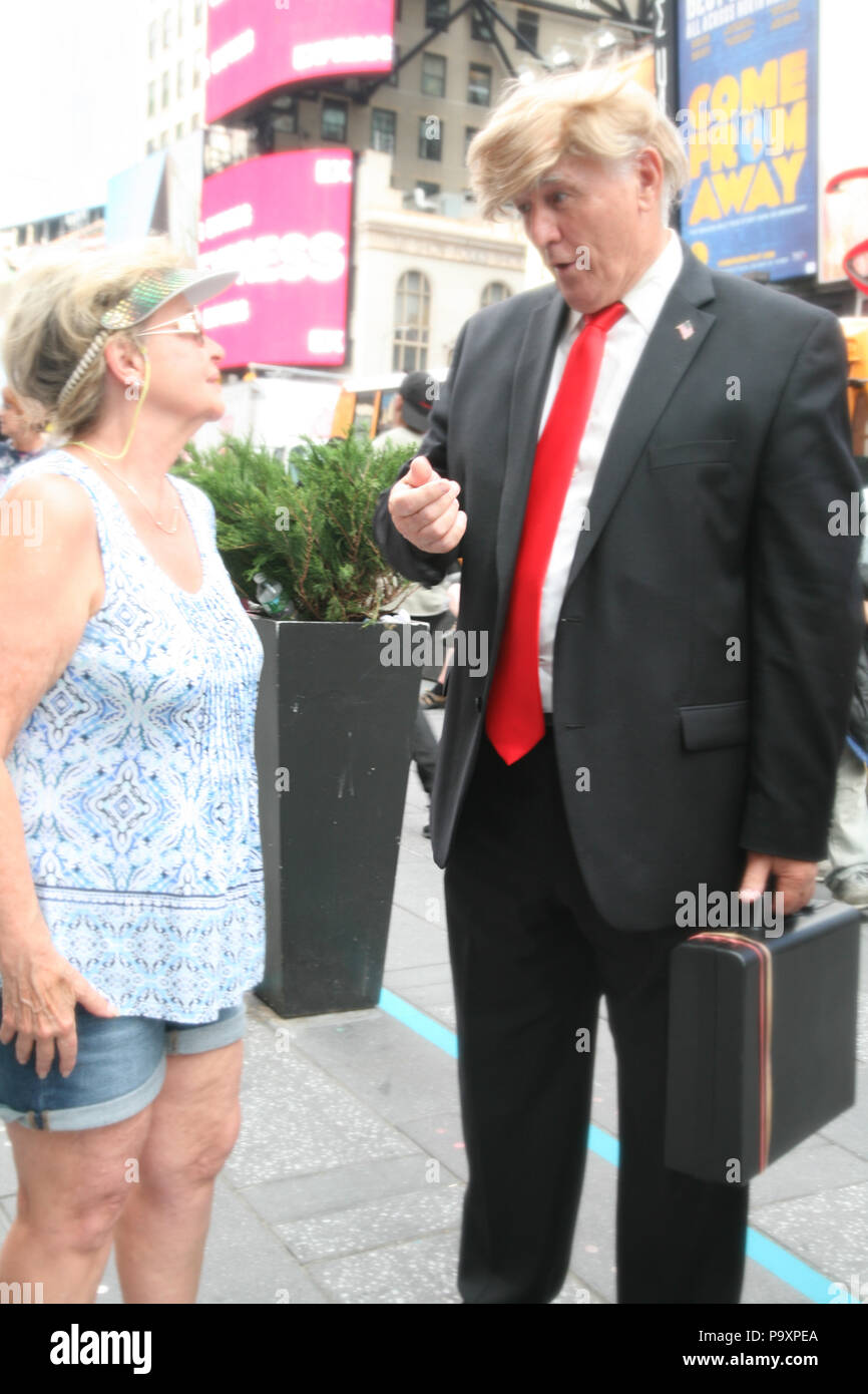 USA, New York, Manhatten, World Population Day, Brightly President Trump look alike posing for photos. Stock Photo