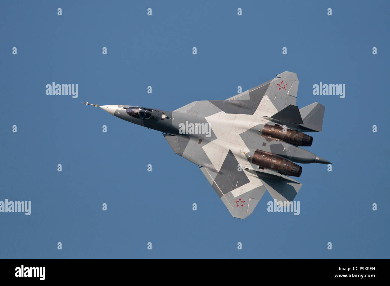 The Sukhoi T-50, a flying prototype of the stealthy, single-seat, twin-engine jet fighter of 5th generation, also designated as PAK FA, pictured durin Stock Photo
