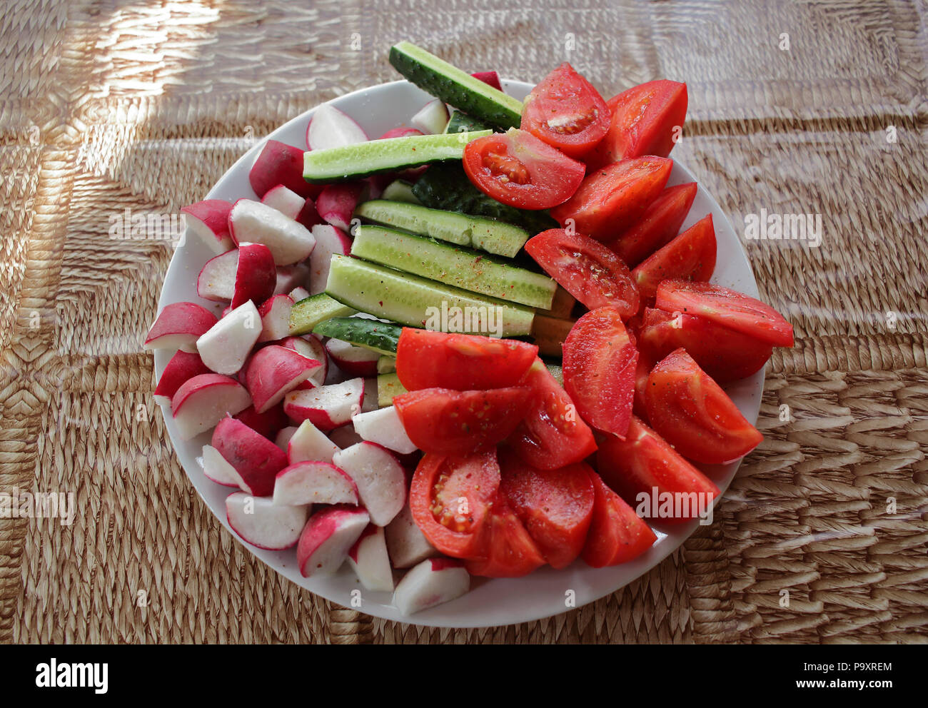 Fresh cut vegetables on the plate photo Stock Photo
