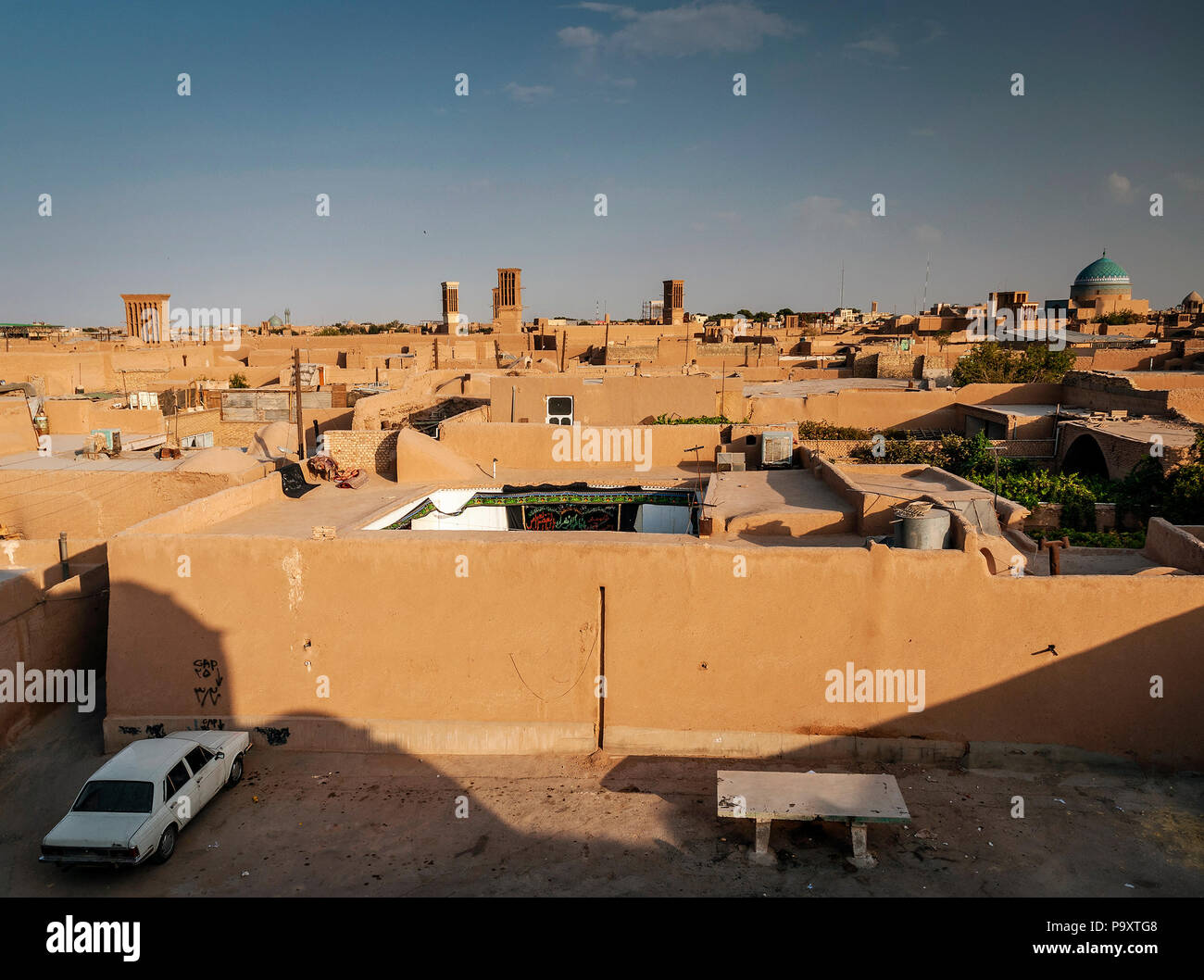downtown rooftops wind towers and landscape view of yazd city old town ...