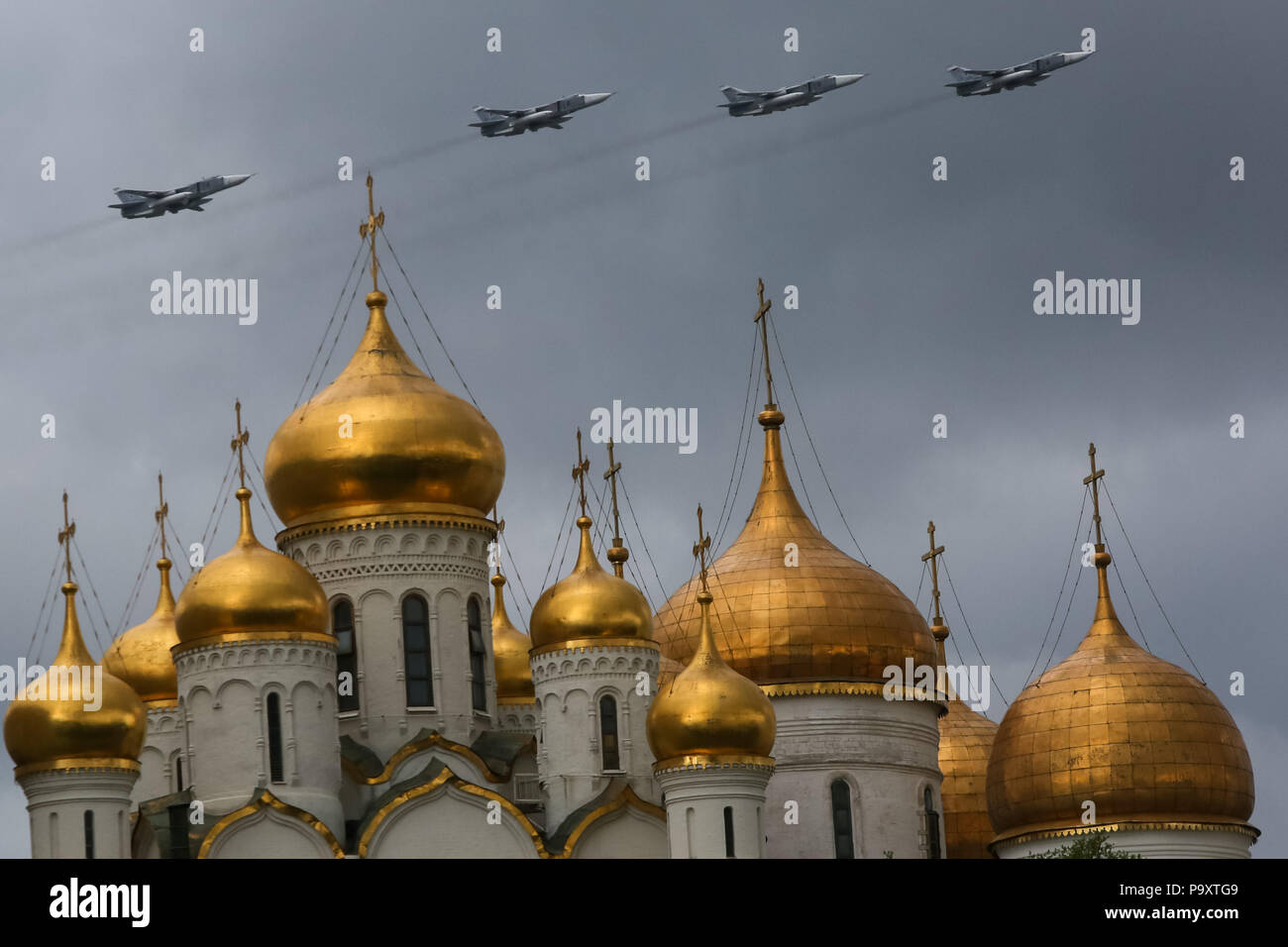 Four Sukhoi Su-24M  jets of Russian Air Force fly in formation over the Kremlin of Moscow during a rehearsal for the Victory Day military parade to ce Stock Photo