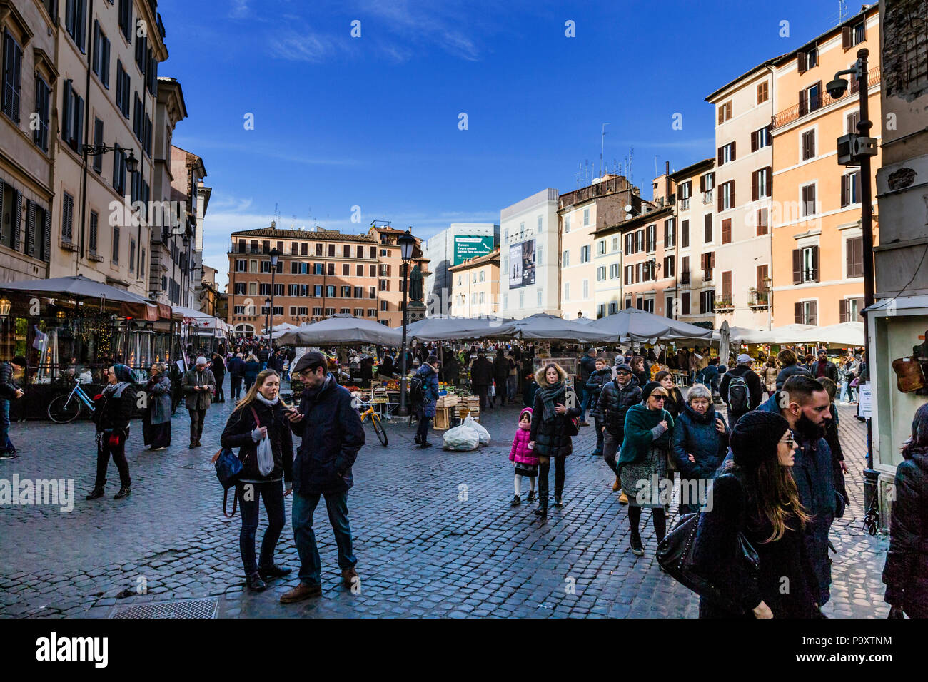 Campo de Fiori is a rectangular square south of Piazza Navona in Rome,  Italy, at the border between rione Parione and rione Regola. It is  diagonally southeast of the Palazzo della Cancelleria