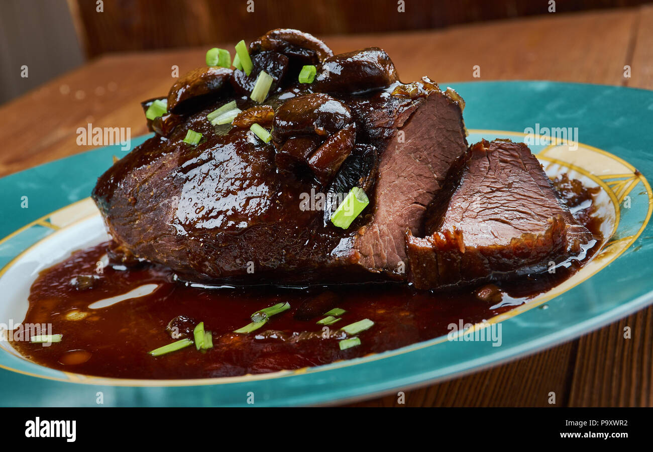 Slow Cooker Balsamic Glazed Roast Beef Stock Photo Alamy