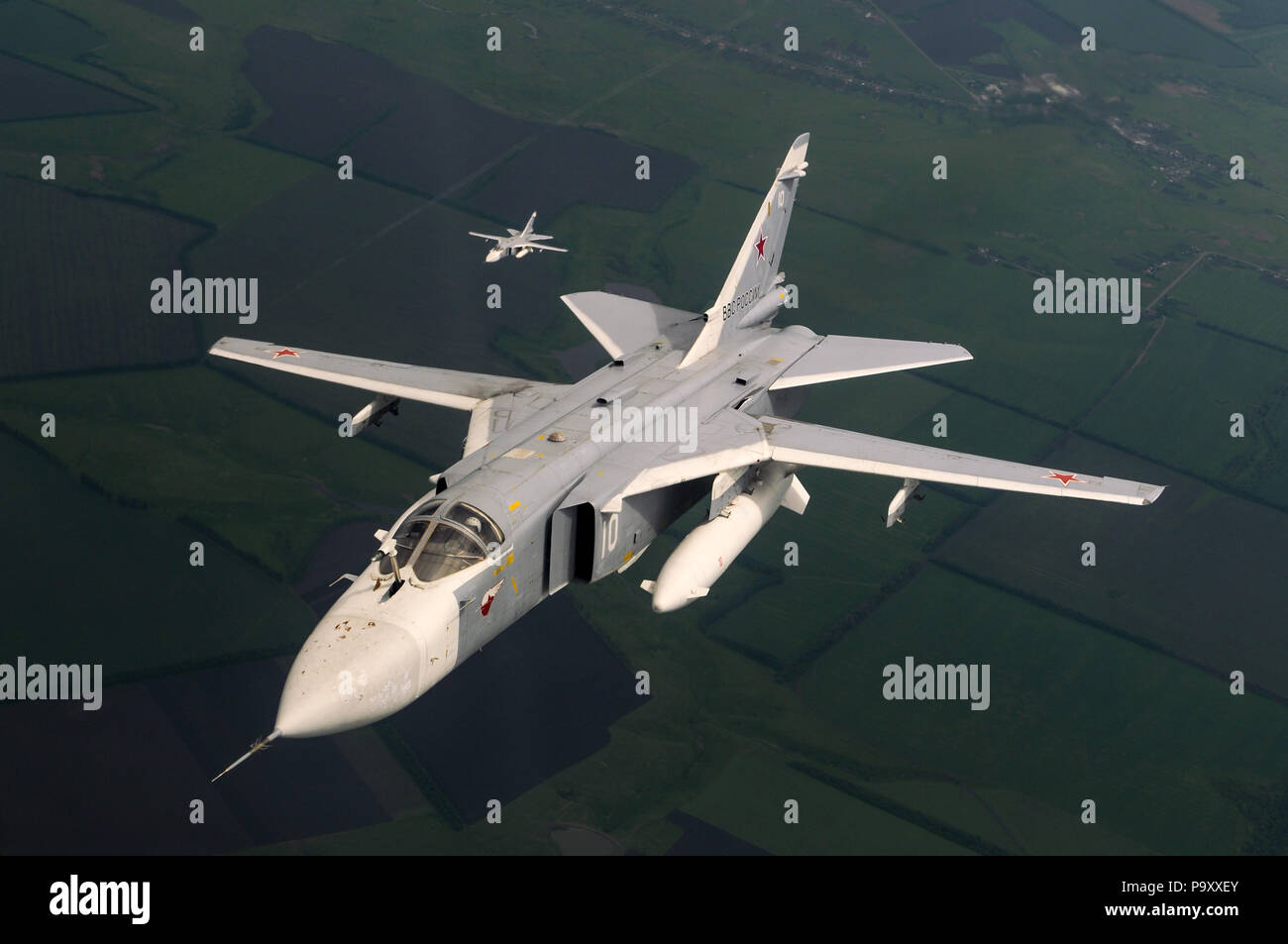 The Sukhoi Su-24M (NATO code - Fencer)  supersonic, all-weather attack aircraft/interdictor of Russian Air Force in flight. Stock Photo