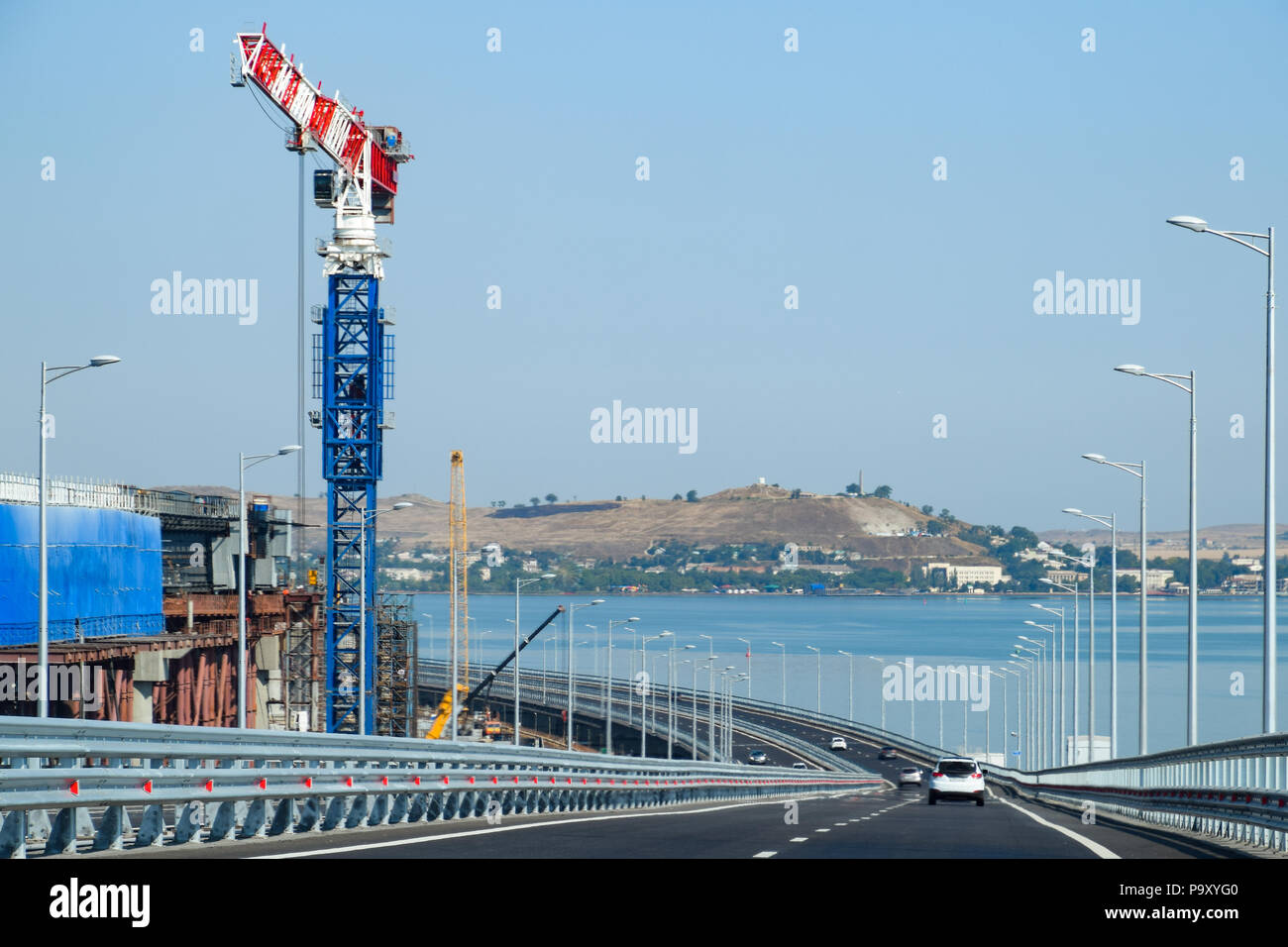 Driving along the Crimean bridge. A grandiose building of the 21st century. The new bridge. Stock Photo