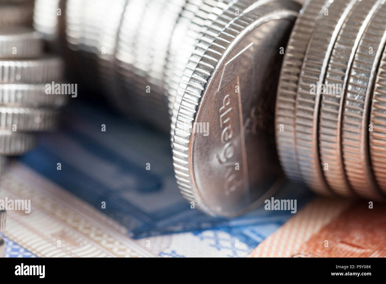 stacked in piles and piles of silver coins - rubles belarus Stock Photo