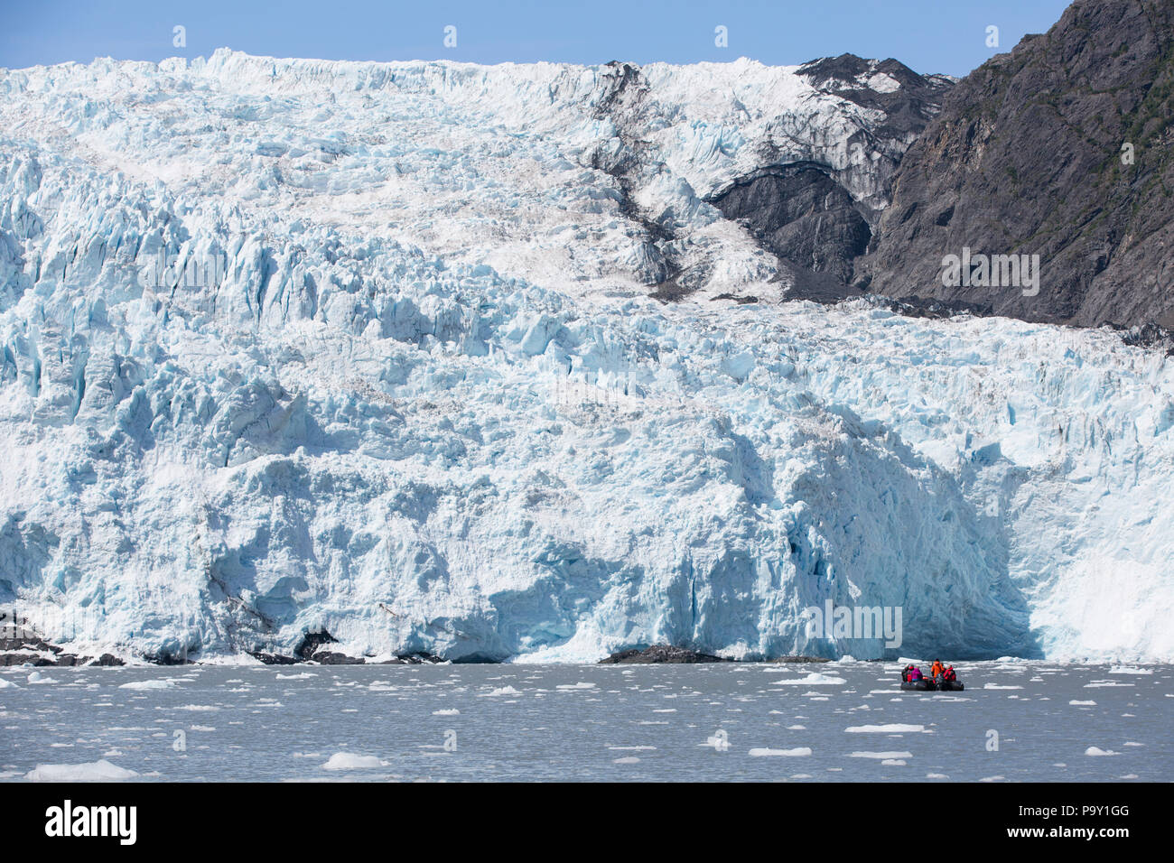 Zodiac in front of Holgate Glacier, Alaska Stock Photo